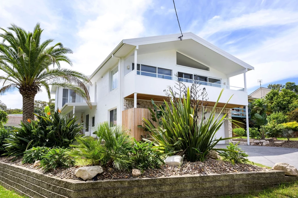 exterior of two storey home with balcony